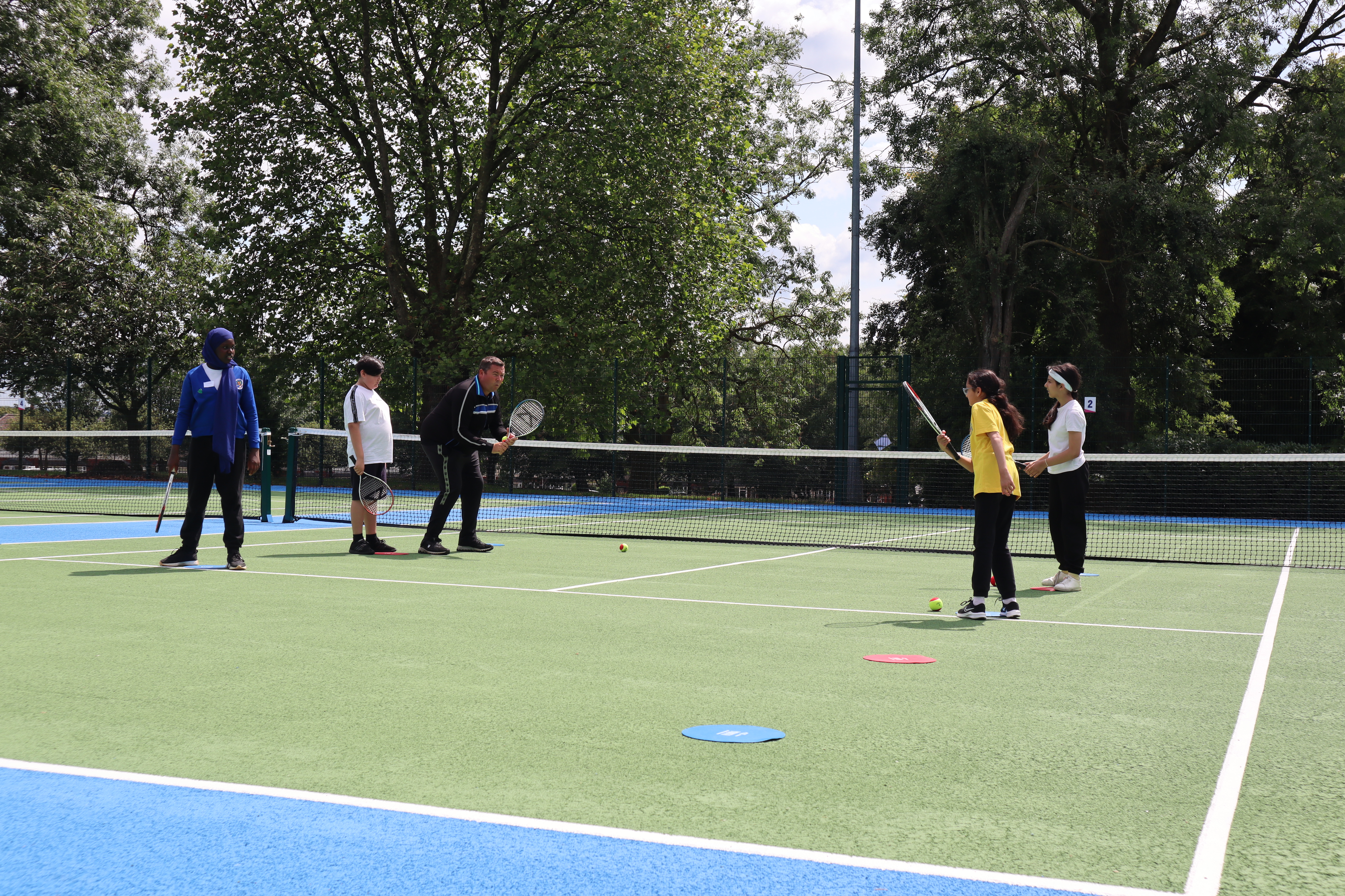 Pupils from St Mark’s Primary School have a tennis lesson from We Do Tennis.