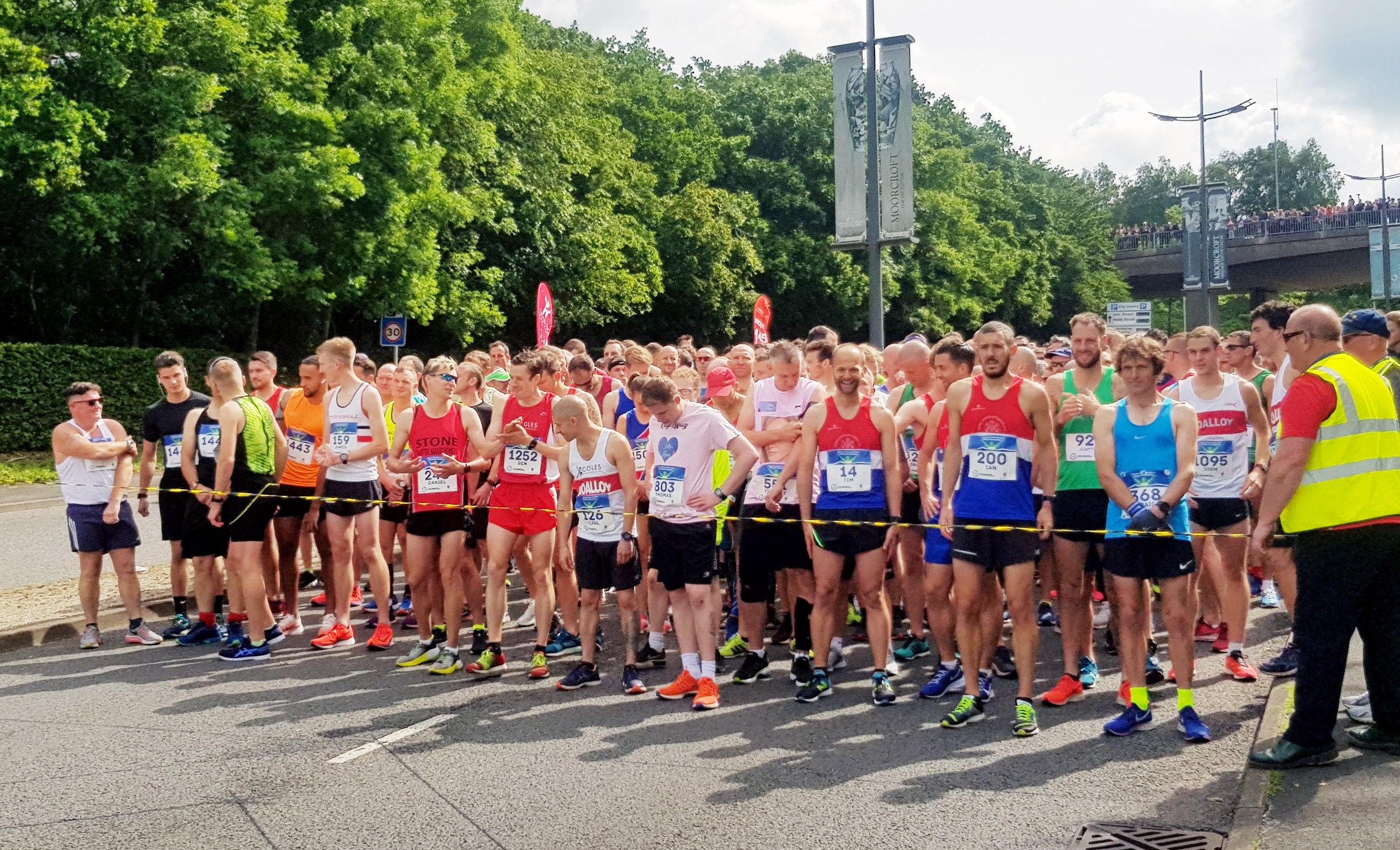 Runners standing at the start line for Potters Arf race