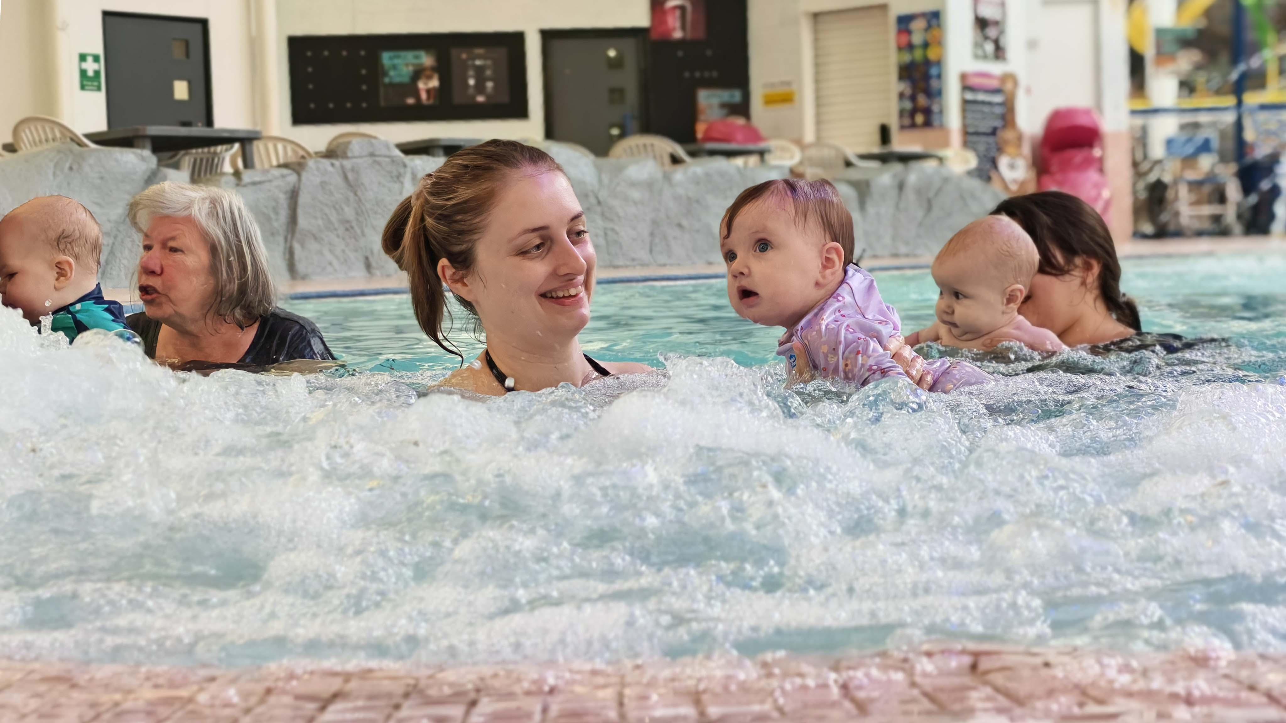 Dimensions swimming -  a mother and a child swimming together at dimensions leisure centre