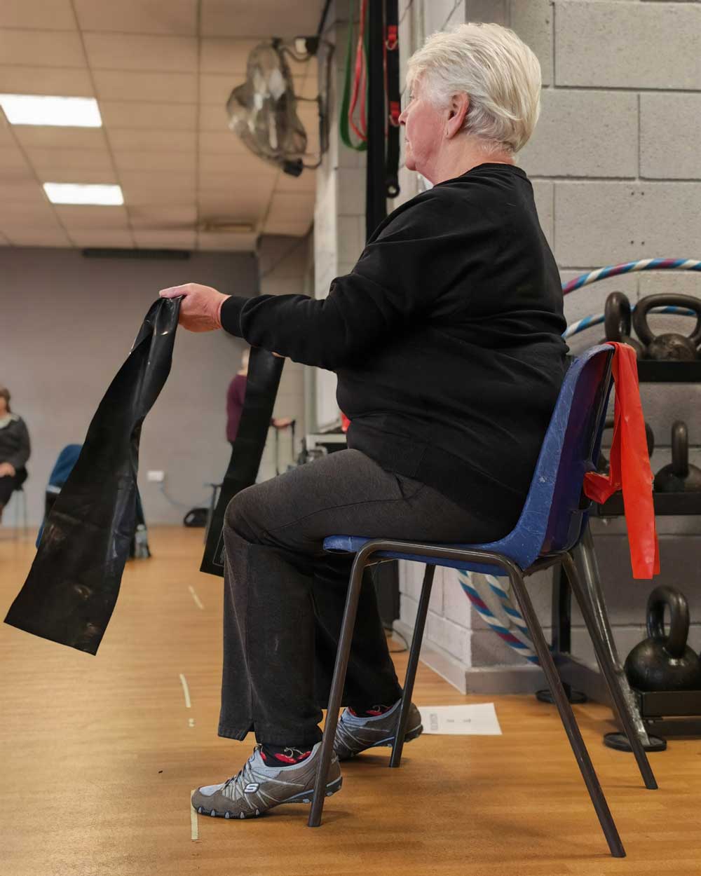 Woman doing chair based exercise
